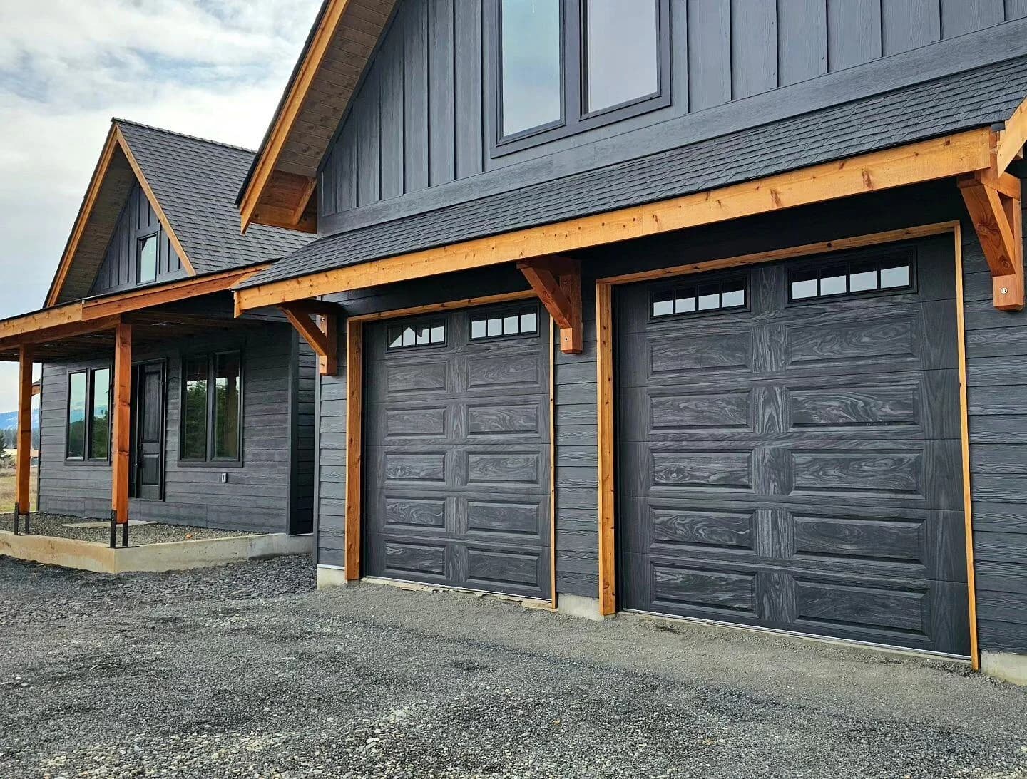 CHI carriage house doors on dark modern farmhouse